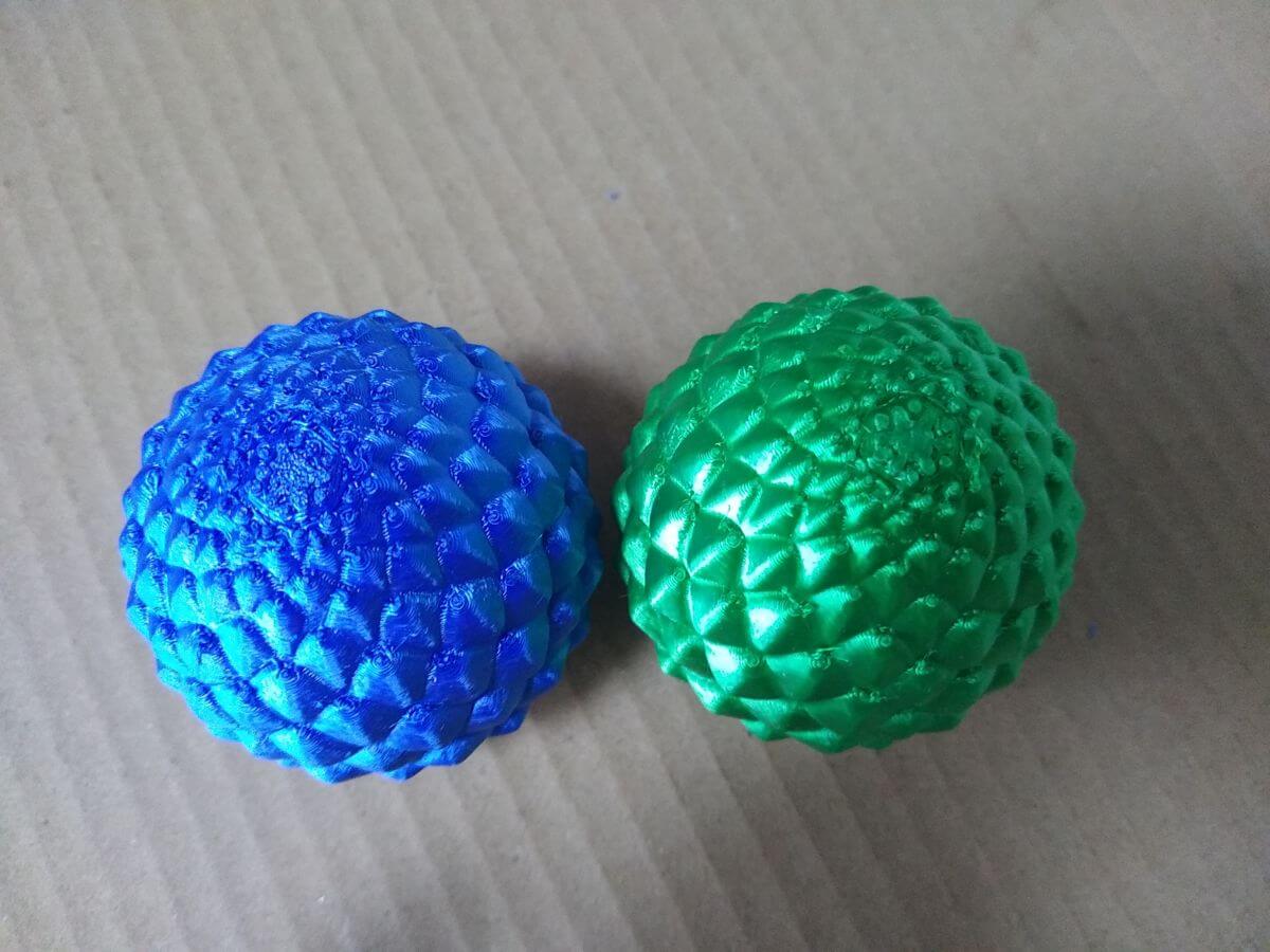 Sharp burrs on the 3D printed dragon egg surface from incomplete support removal