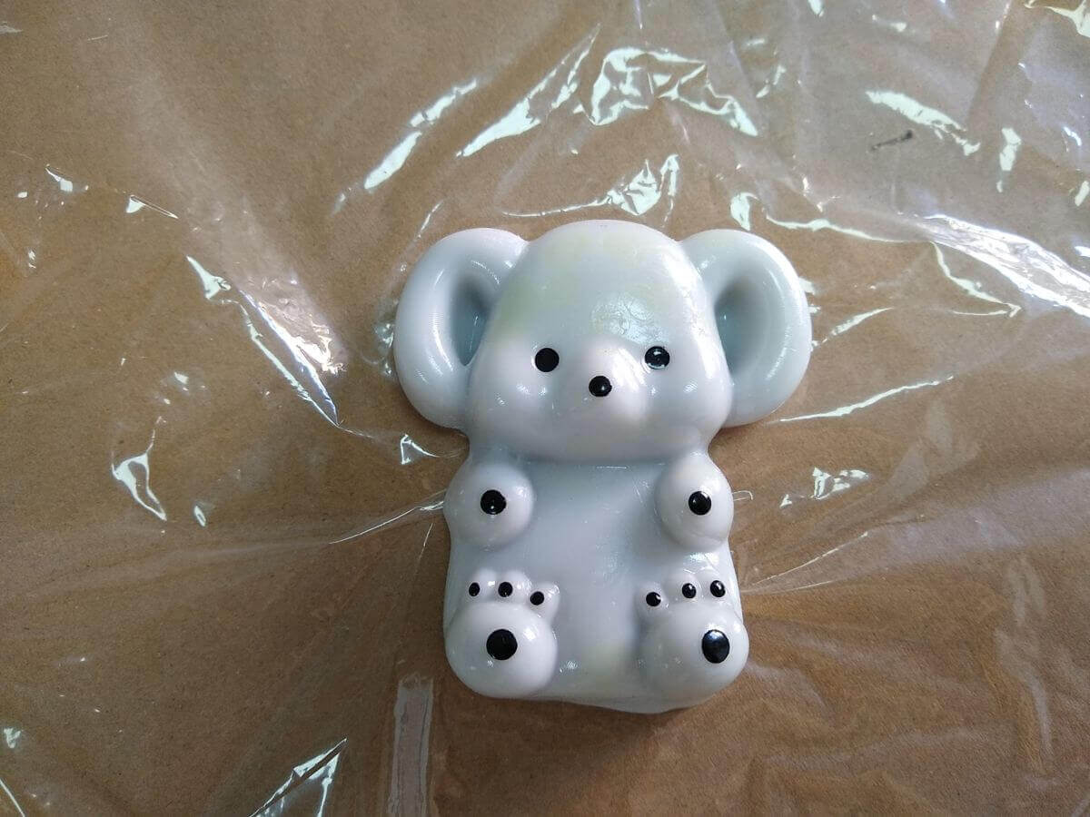 Staining pattern detail on sticky TPR koala - multiple affected units in batch