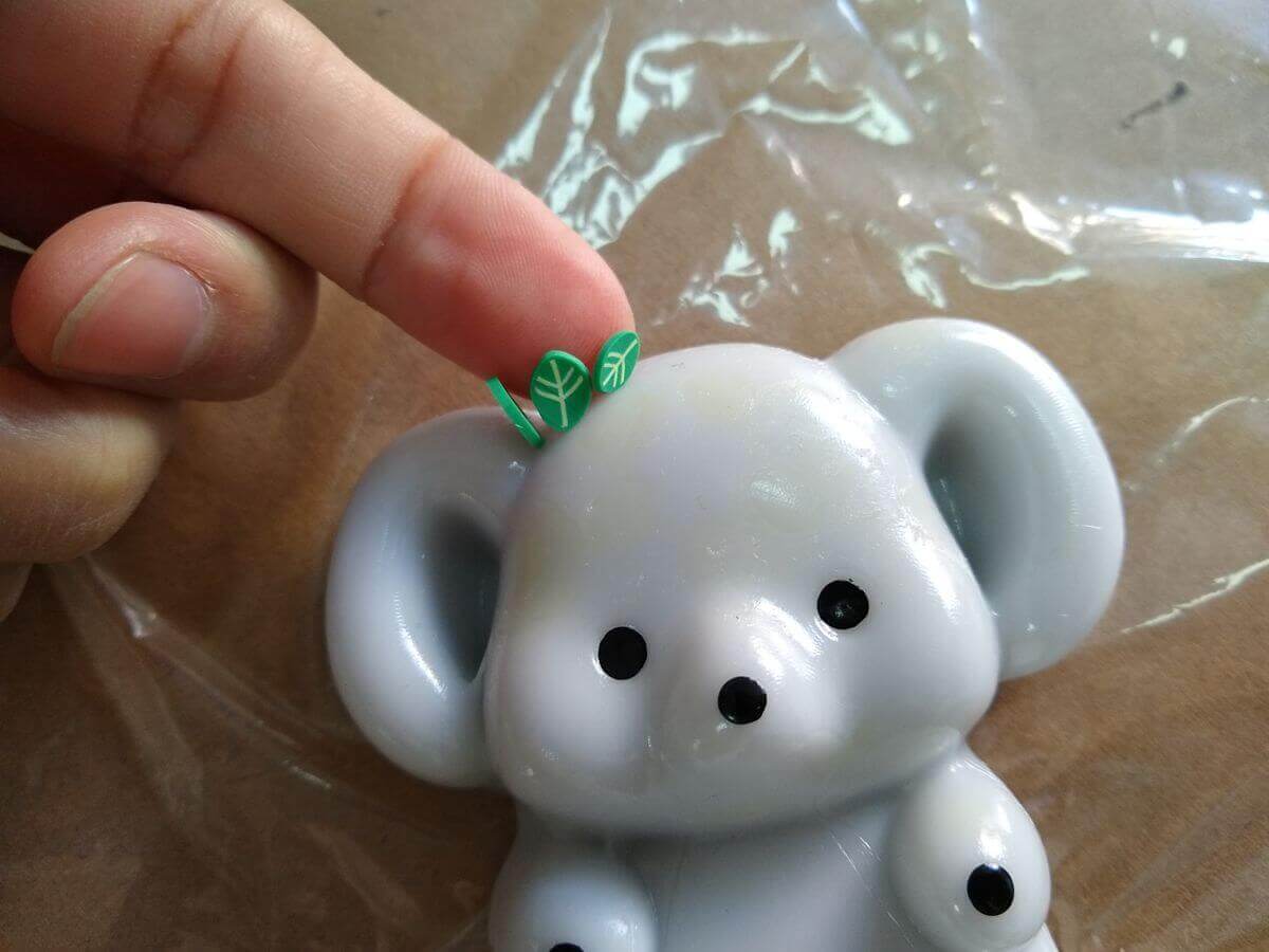 Multiple squishy toy units showing color bleeding from leaf contact