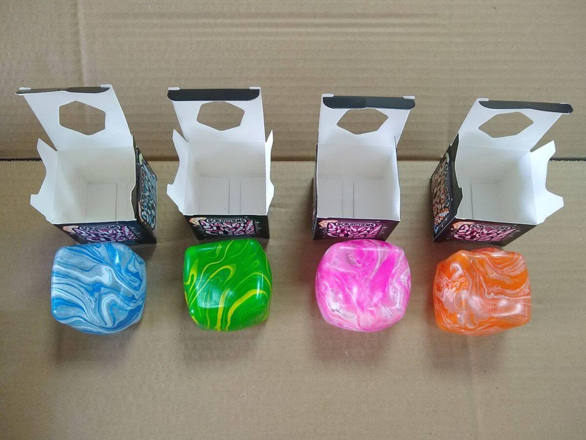 TPR sugar-filled squishy cubes unpacked - product itself is flawless, only the box is ruined