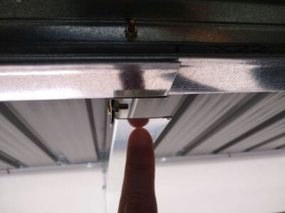 Sharp Exposed Metal Edge on Garden Metal Shed — Safety Inspection Case