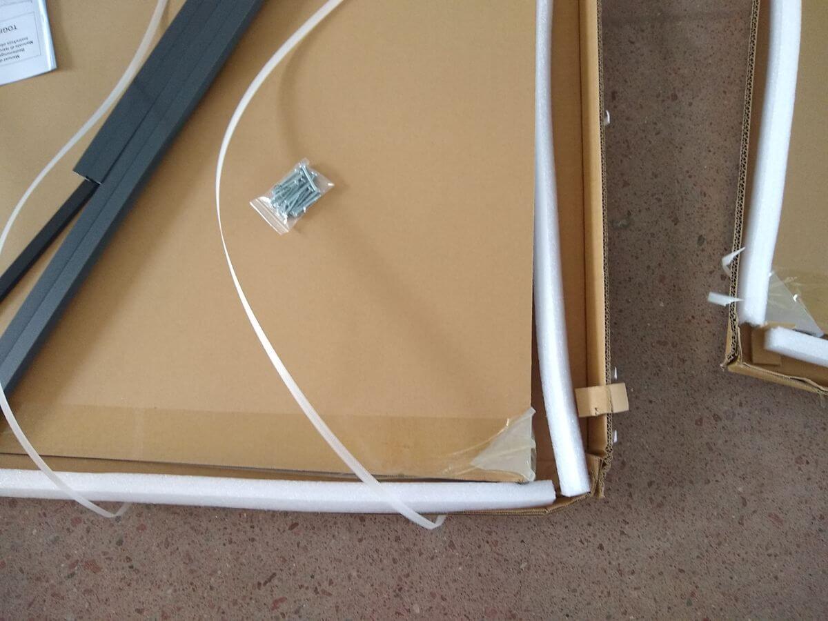 Close-up of carton and product damage after drop test