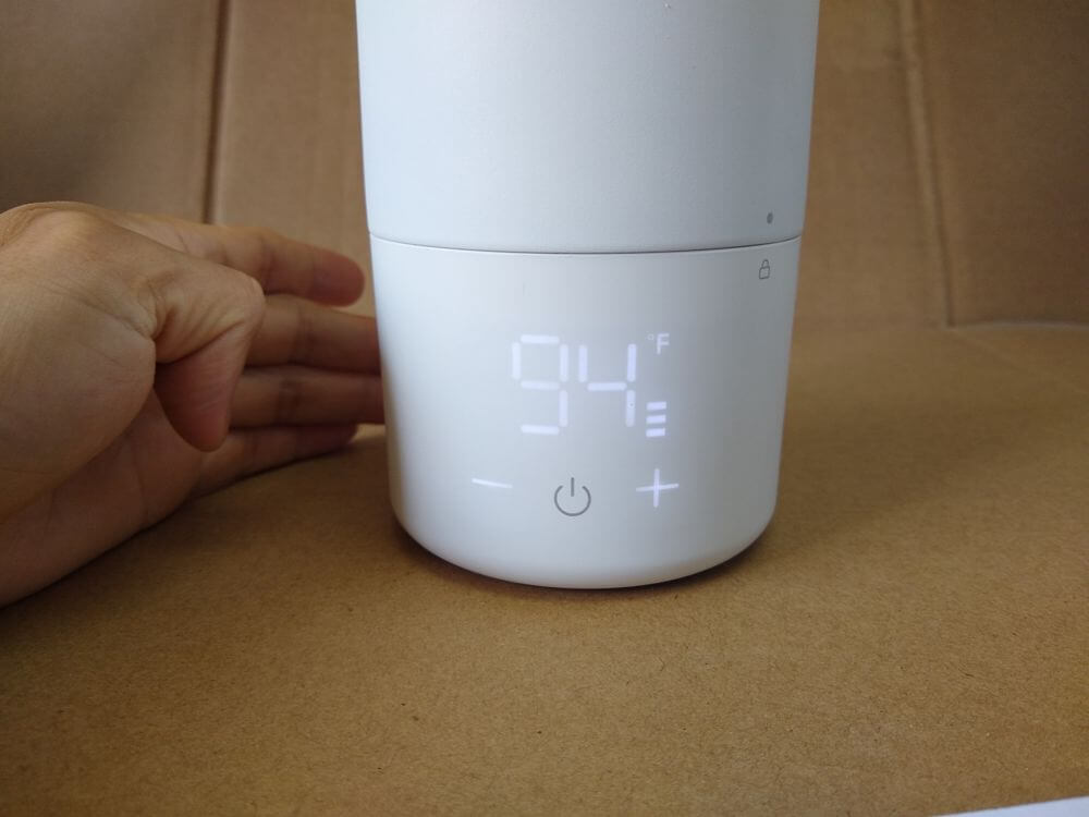 Temperature unit — display showing 94°F in normal operation mode