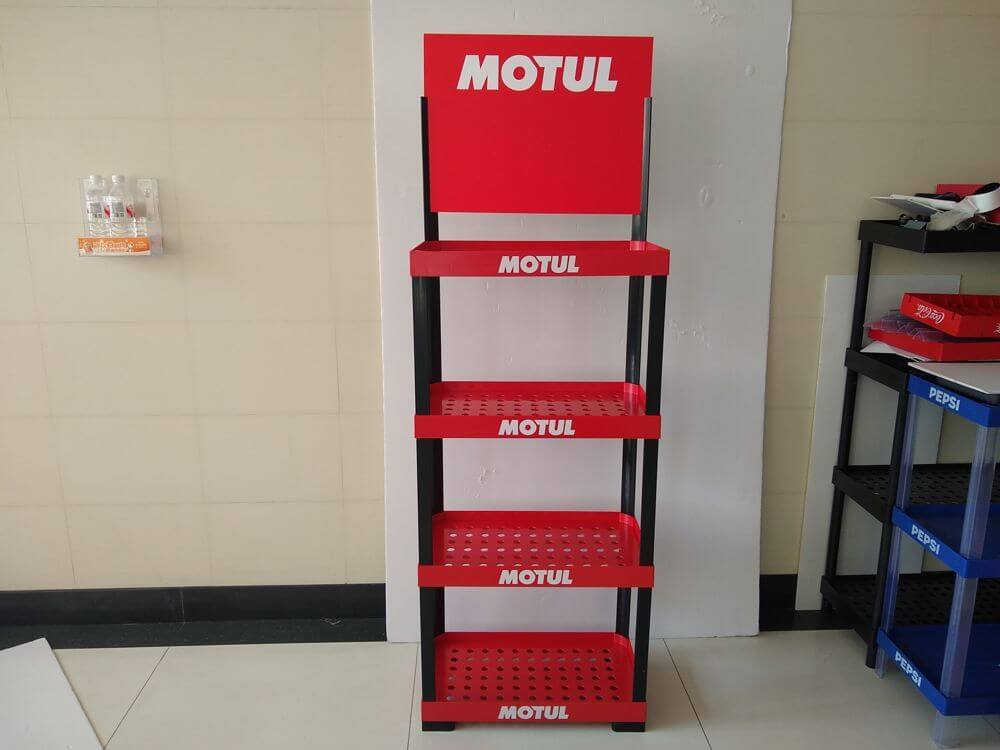 Display rack - injection molding workshop showing in-house equipment