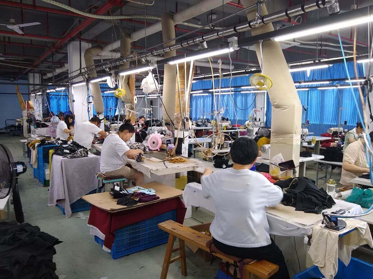 Workshop view — fabric cutting and preparation area