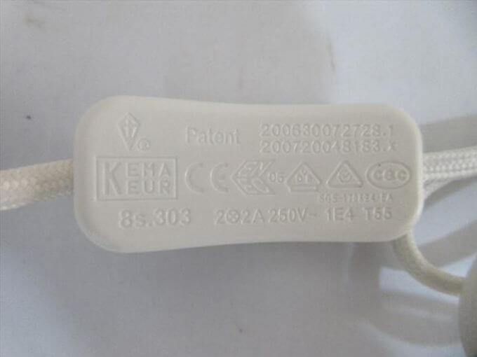 Electrical inspection in China: switch and connector verification on power adapter