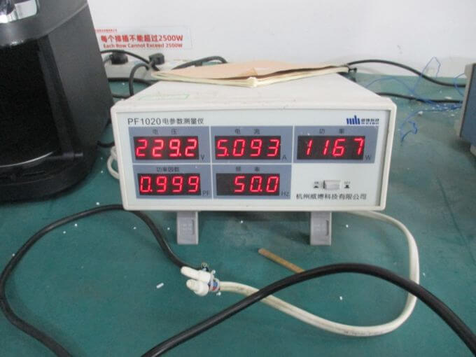 Electrical inspection in China: wattage reading compared against the rated label
