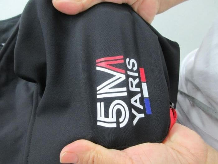 Apparel inspection in China: logo print stretch test showing print durability