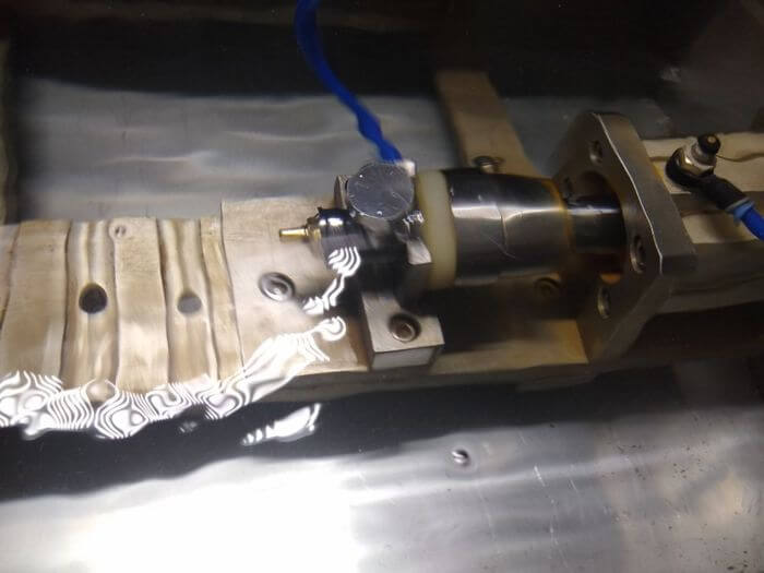 Building materials inspection in China: angle valve sealed in air-pressure leak test fixture