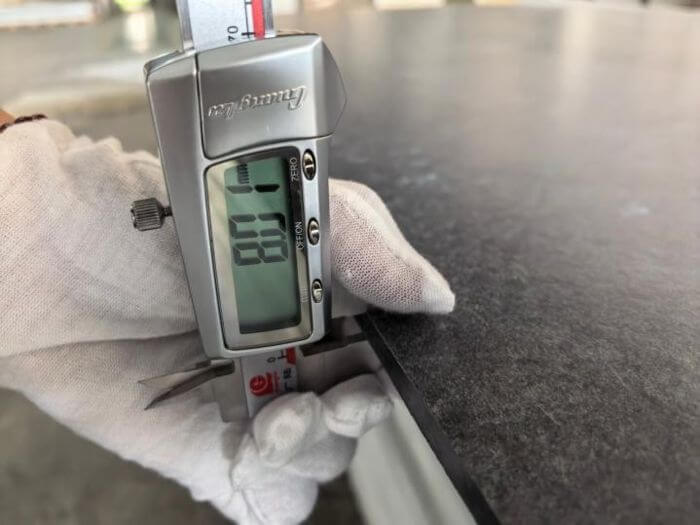 Building materials inspection in China: stone slab thickness measured at all four corners