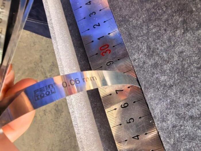 Building materials inspection in China: slab edge flatness verification, gap reading against blade