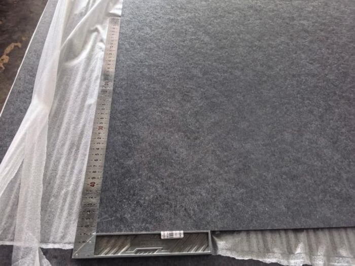 Building materials inspection in China: slab edge straightness check with straightedge