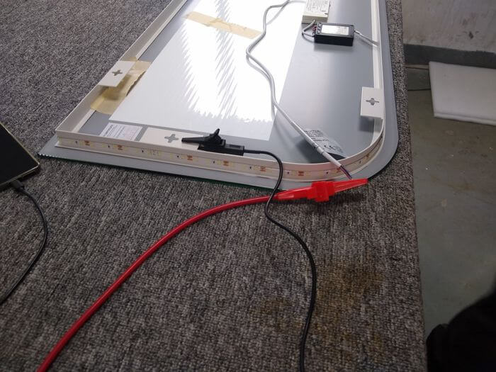 Furniture inspection in China: hi-pot test connection on LED mirror wiring