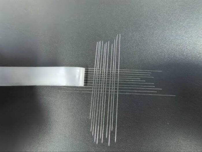 Furniture inspection in China: tape adhesion test on coated furniture surface