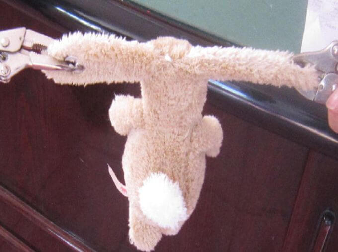 Toy inspection in China: tension pull test on a plush toy