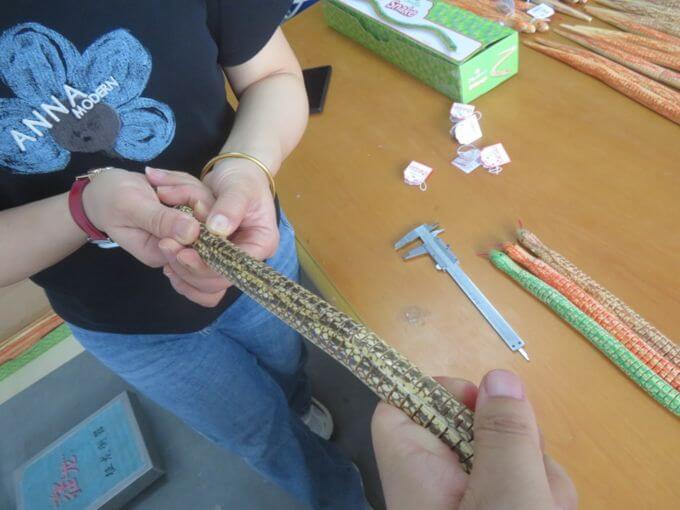Toy inspection in China: tension pull test on a plastic toy component