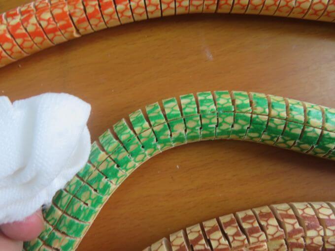 Toy inspection in China: coating rub resistance test on a wooden toy