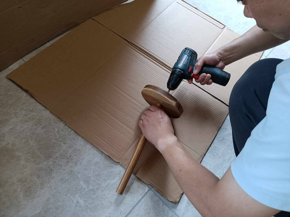 Assembly verification — all acacia wood holder components fit correctly during PSI