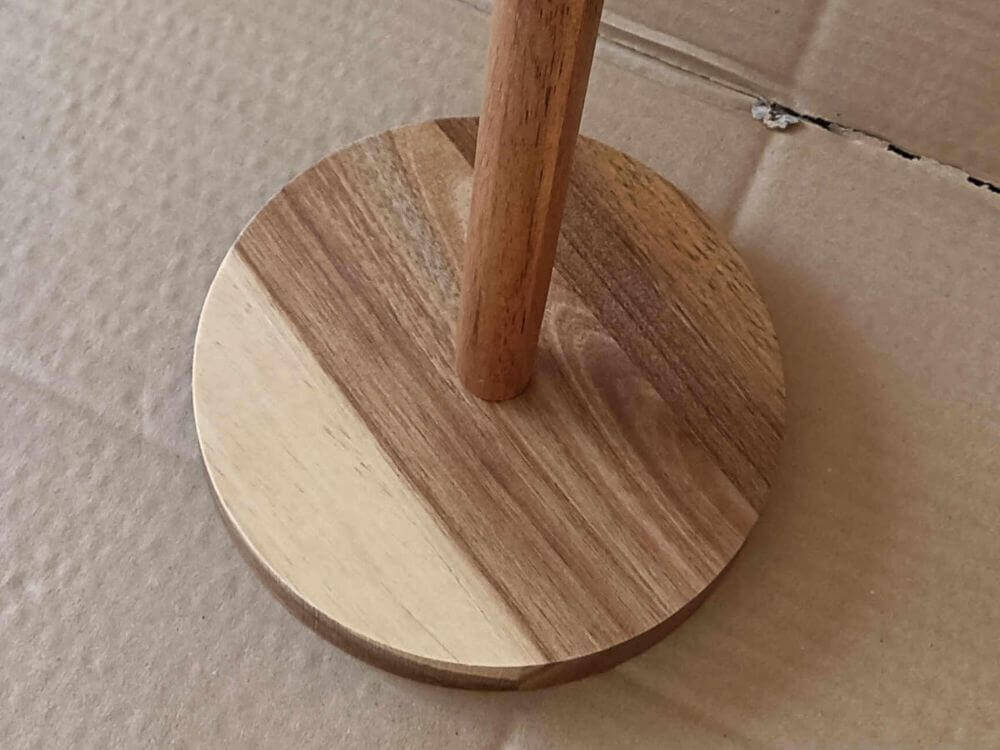 Obvious color variation between acacia wood panels — silent return driver found by CNQ pre-shipment inspection