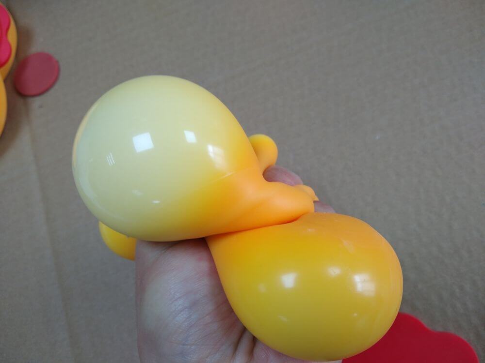 TPR Flour-Filled Bread Toy — overhead view with batch context
