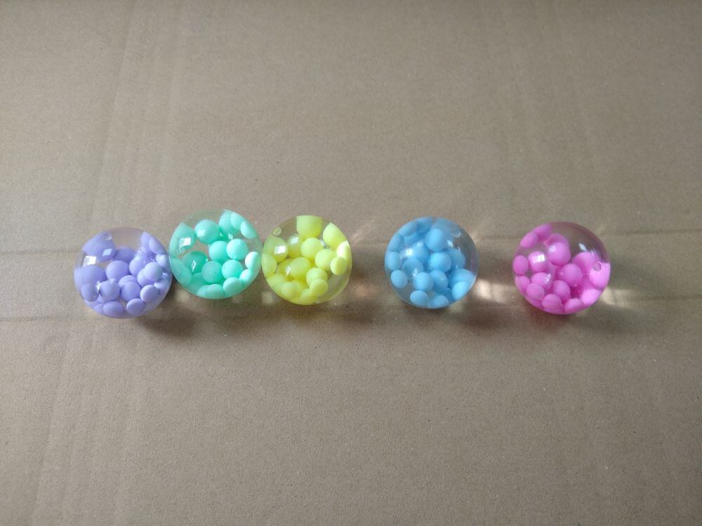 TPR Water-Filled Squeeze Ball — full batch view, assorted colors