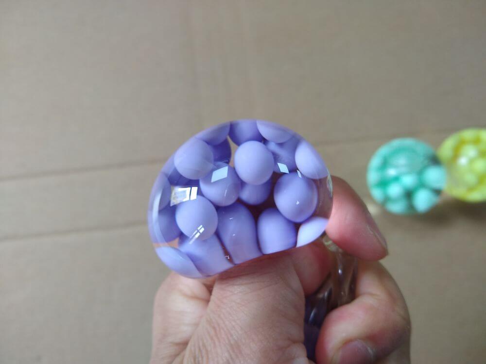 TPR Water Squeeze Ball — hand-squeeze demonstration