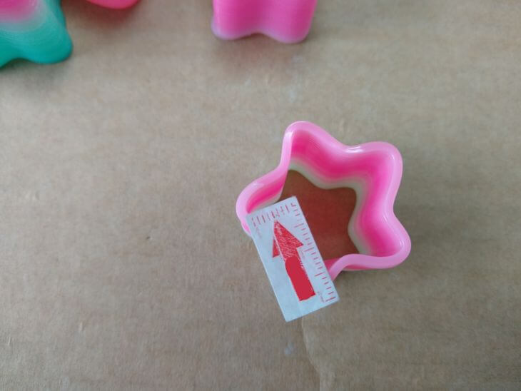 Rainbow spring toy with sharp cut edge defect found at final inspection