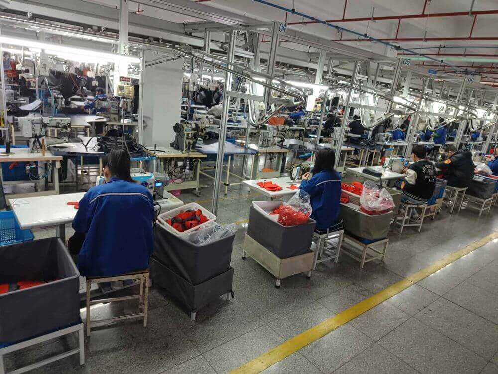 Production line — workers self-inspect while producing